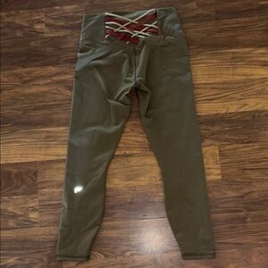 Fabletics Green Leggings with Red and Beige Crisscross